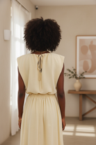 Back view of Chloe balloon blouse in elegant lifestyle setting