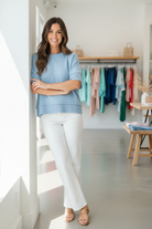 blue drop shoulder sweater top wall lean boutique brunette