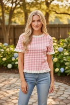 SO ME pink and white gingham knit sweater top front view, scalloped ruffle neckline, short ruffled sleeves, ribbed ruffle hem, lightweight slightly stretchy knit