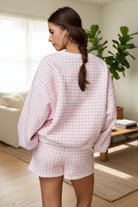 Pink and white gingham cozy chic women's lounge set back view lifestyle