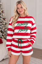 Three quarter view of red stripe Holly Jolly long sleeve pullover and matching holiday shorts