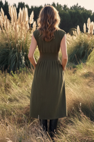 Olive Zip-Front Smocked Waist Midi Dress - back view in golden pampas grass field
