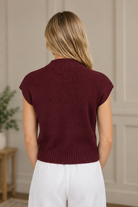 Burgundy ribbed knit pullover sweater showing back ribbing and extended shoulders from Thread Bar Boutique