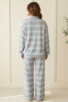 Back view of the Slow Morning Sky Blue Stripe lounge set showing the relaxed long sleeve pullover and full length wide leg pants.