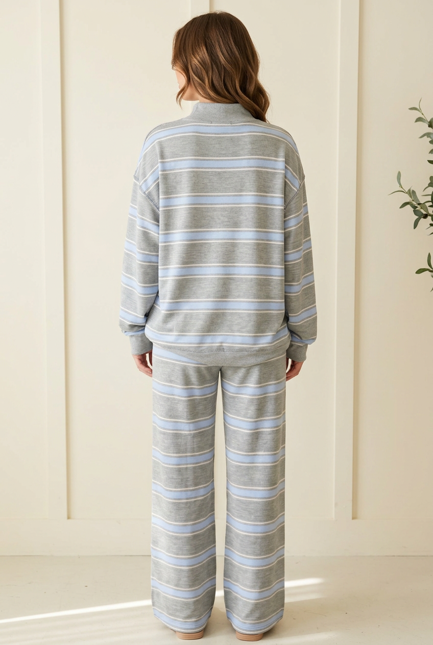 Back view of the Slow Morning Sky Blue Stripe lounge set showing the relaxed long sleeve pullover and full length wide leg pants.