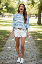 Kyla sky blue striped textured half sleeve loose top — candid outdoor lifestyle styled with white denim cutoffs