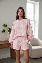 Pink camo matching set in stylish home interior