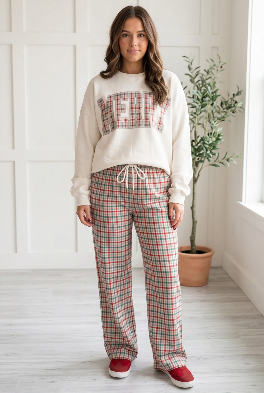 Front view of cream, grey and red plaid pants with a white drawstring waist and full length wide legs.