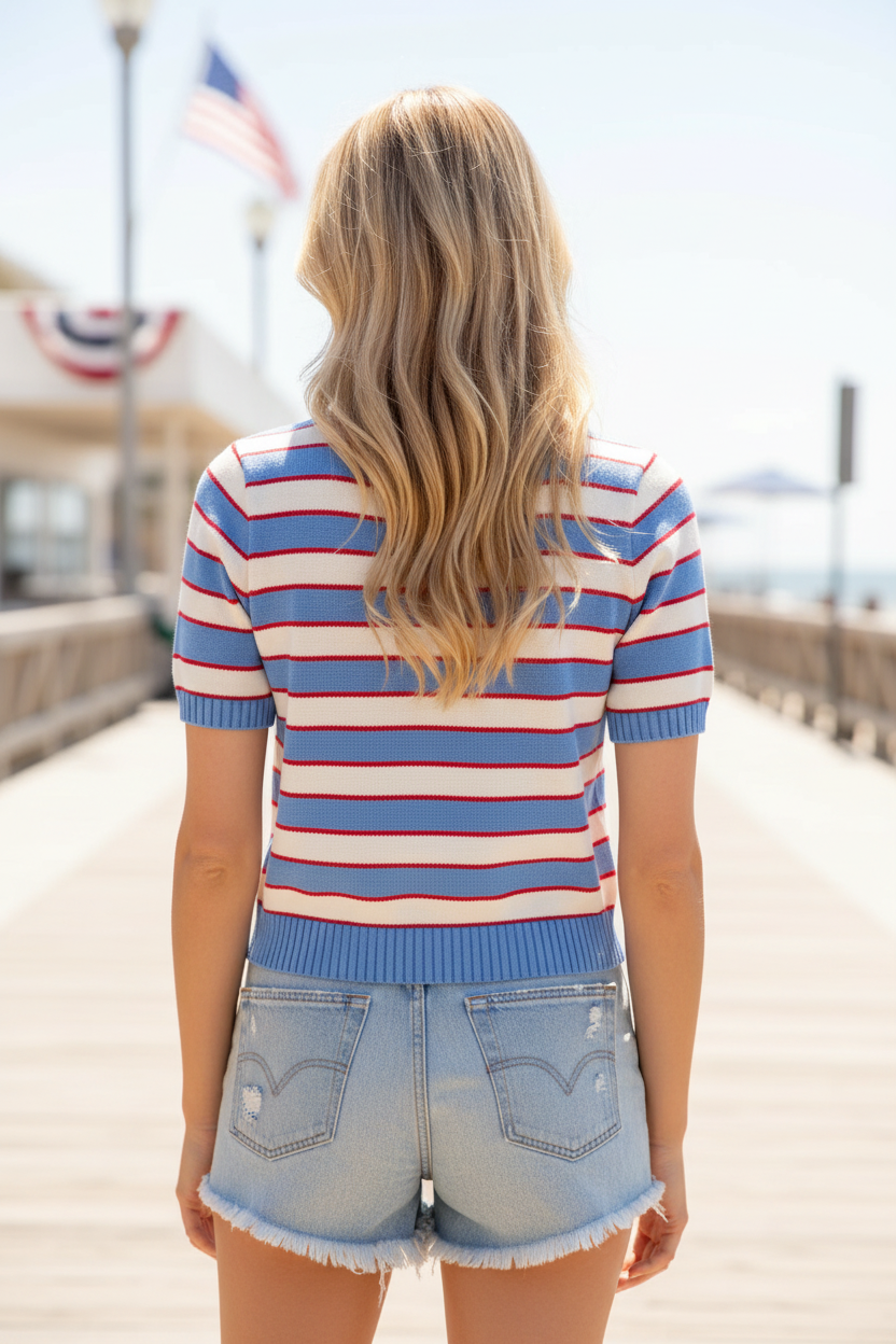 Blue, white and red stripe knit sweater top — back view showing ribbed hem and short sleeves
