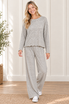 Cloud Cozy striped two piece lounge set in soft brushed fabric with a relaxed boxy top and full length wide leg pants, walking pose