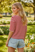 Red ivory stripe waffle knit button front top rear view — textured horizontal stripe detail blonde model outdoor lifestyle
