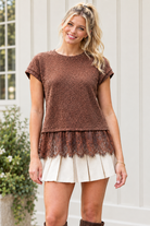 Closer view of brown chenille knit texture, rolled cap sleeves and delicate scalloped eyelash lace along the hem.