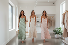 Ruffled Spaghetti Strap Maxi Dress - all three colors sage, beige and blush pink, trio walking and laughing, boutique setting