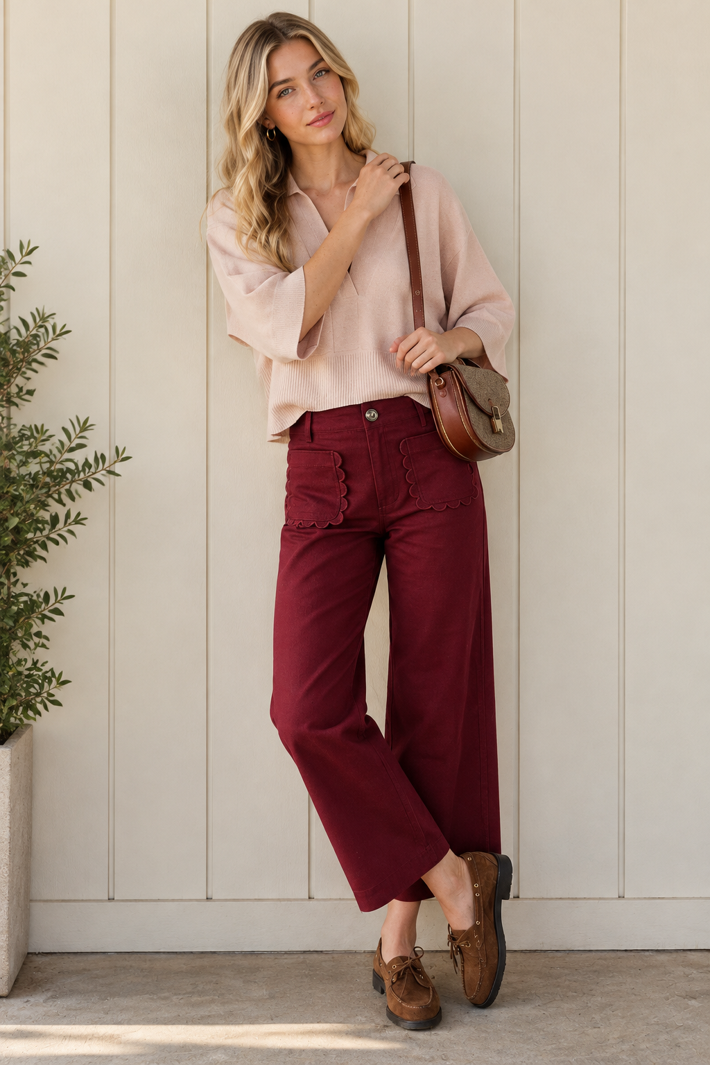Burgundy high waisted cropped wide leg pants with scalloped patch pockets, styled with a blush knit top.