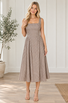 Front view of mocha brown and cream gingham midi dress with square neckline and wide shoulder straps