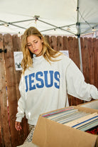 Reversible faith sweatshirt with Jesus and God Is Good text in ash grey and vintage blue