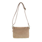 Sleek buffalo grain vegan leather pouch clutch with removable straps for a day-to-night western look. crossbody view
