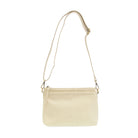 Sleek buffalo grain vegan leather pouch clutch with removable straps for a day-to-night western look. cross body view cream