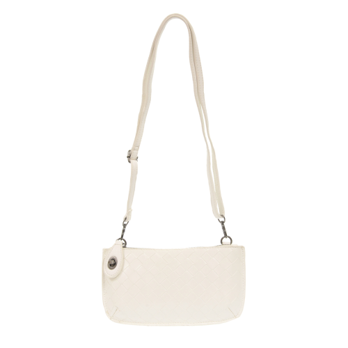 Wide-woven vegan leather 3-in-1 crossbody bag in a sophisticated textured finish with brass turn lock closure. white color
