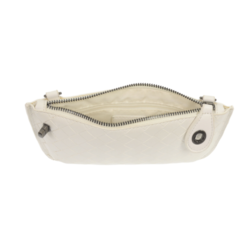 white color Interior of the woven bag showing six built-in credit card slots and a zippered privacy pocket for organization.