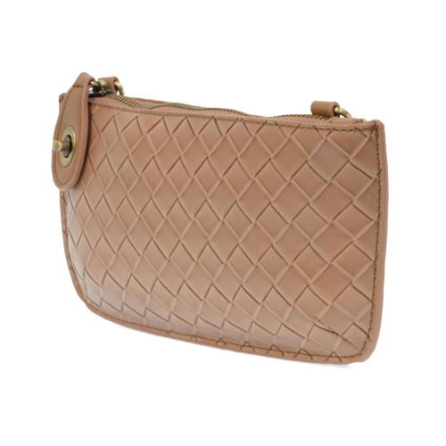 Compact woven vegan leather clutch showing the slim, travel-friendly profile and adjustable crossbody strap. chestnut color
