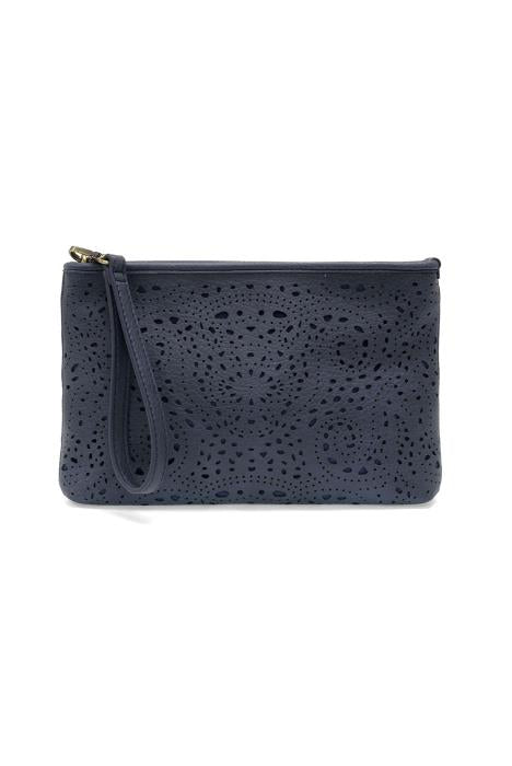 Quinn laser cut eyelet crossbody bag in soft vegan leather with adjustable shoulder strap and brass hardware. Navy