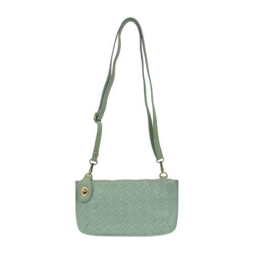 Wide-woven vegan leather 3-in-1 crossbody bag in a sophisticated textured finish with brass turn lock closure. sea foam color