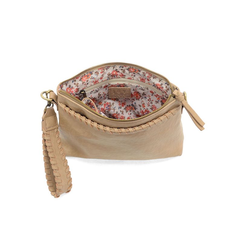 Interior of the Joy Susan Oakleigh bag featuring the beautiful floral print fabric lining and multi-pocket organization.