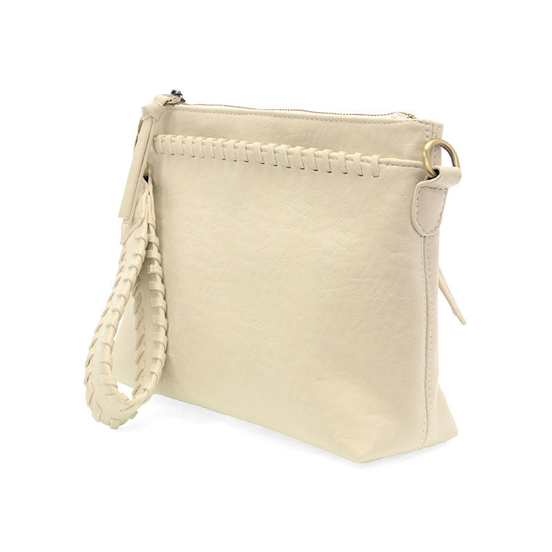 Joy Susan Oakleigh 3-in-1 crossbody bag in buffalo grain vegan leather with western whipstitch accents.