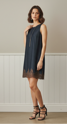 Dark wash denim shift dress with lace hem detail by Able from Thread Bar Boutique