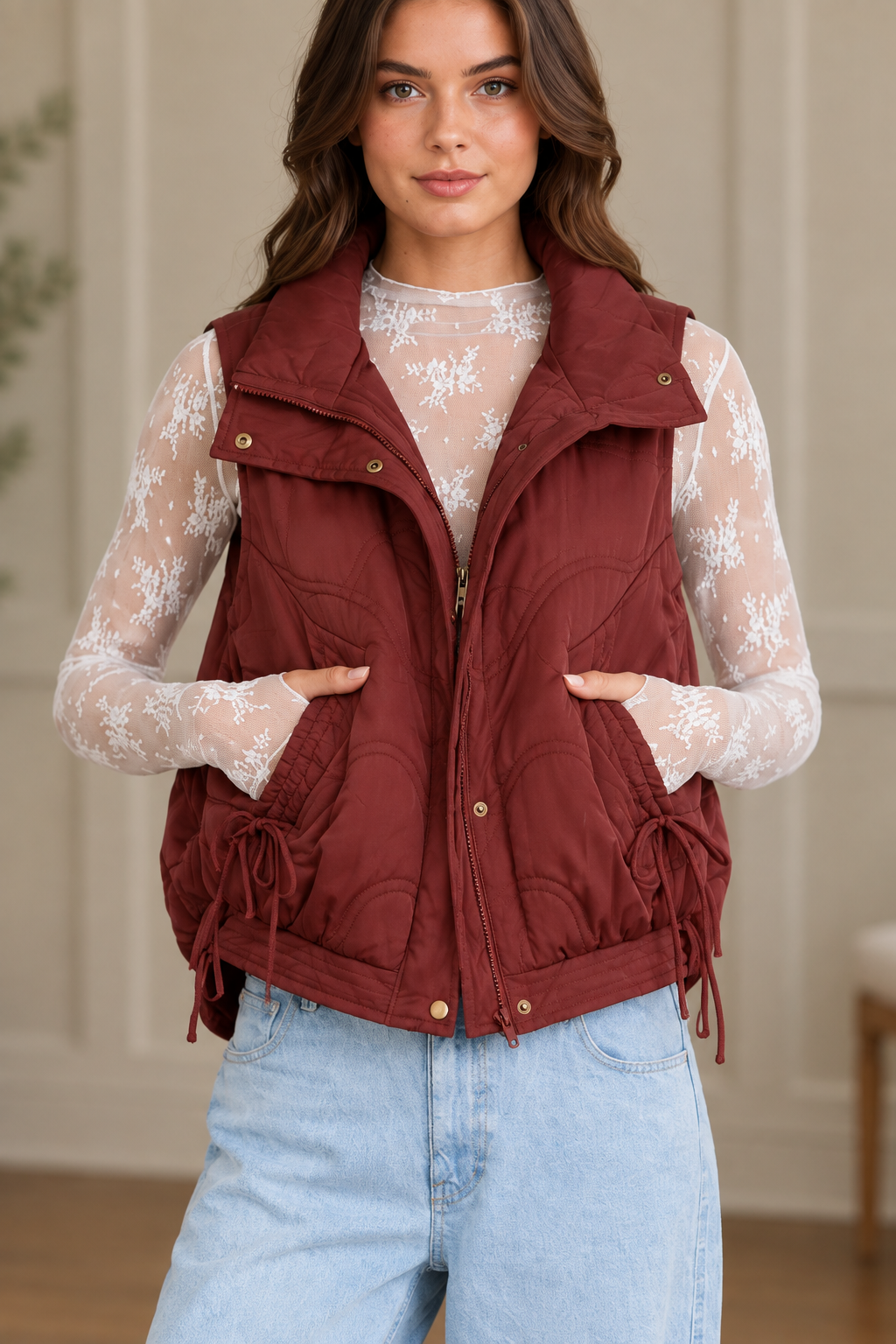 Wave quilted vest detail with gold snap buttons, zip front, ruched pockets, and hem ties from Thread Bar Boutique