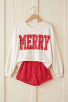 MERRY sweatshirt and shorts hanging product photo