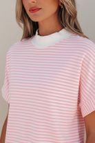 Close-up detail of white contrast ribbed mock neck collar and pink and white stripe soft cotton fabric on two-piece short set, Thread Bar Boutique