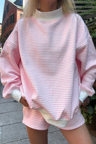 Pink striped casual two-piece set with mock neck sweatshirt and pull-on shorts