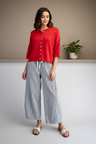 Women's navy stripe barrel leg pants relaxed full body look — cropped cardigan outfit inspo, wide leg tapered ankle style