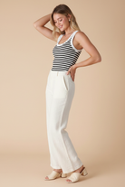 Nikibiki white black striped ribbed tank top - crew neck reversed with wide-leg trousers