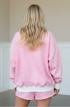 Pink stripe two-piece lounge set with oversized mock neck sweatshirt and shorts