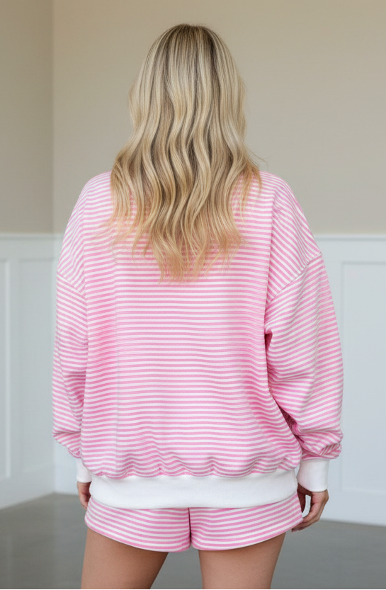 Pink stripe two-piece lounge set with oversized mock neck sweatshirt and shorts