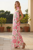 Strapless floral maxi dress with pink and coral print and flowy silhouette