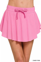 Women’s athletic skort with ruffle hem and inner shorts, breathable tennis skirt with pockets from Thread Bar Boutique