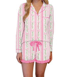 Pink striped floral pajama set featuring breathable fabric, relaxed fit button down top, and ruffled shorts for everyday lounging