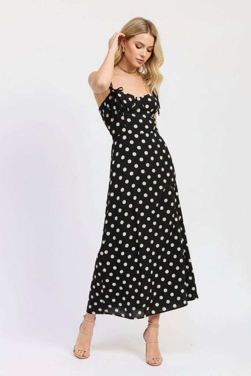 Timeless polka dot maxi dress styled with heeled sandals. Thread Bar Boutique