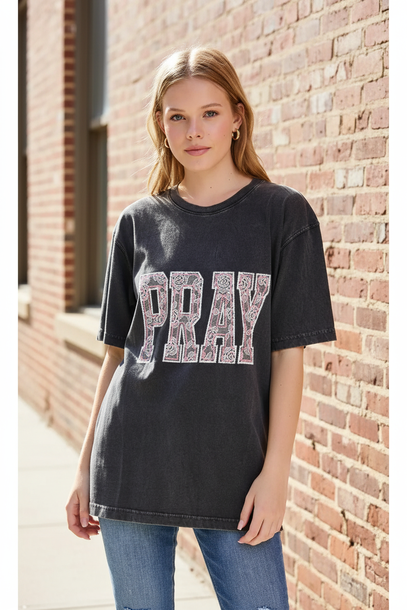 Thread Bar Boutique Zutter Pray graphic boyfriend tee in vintage charcoal mineral wash cotton featuring white and pink lace-style puff print PRAY graphic.