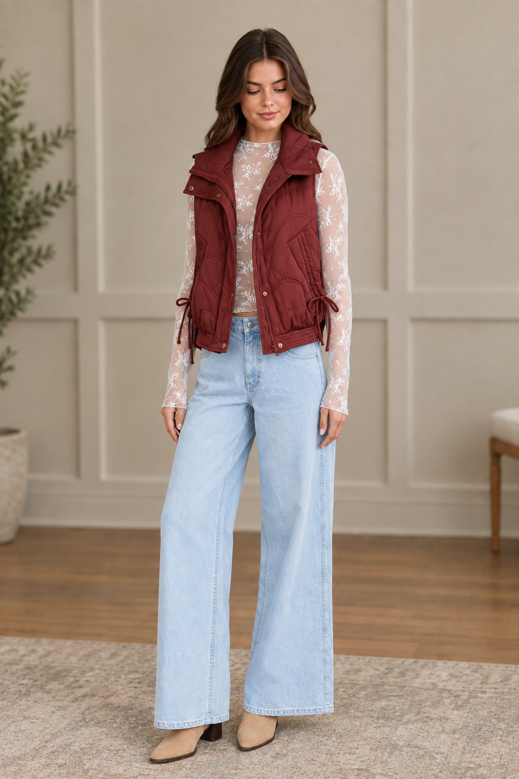 Wave quilted puffer vest in maroon with drawstring hem ties and stand collar from Thread Bar Boutique