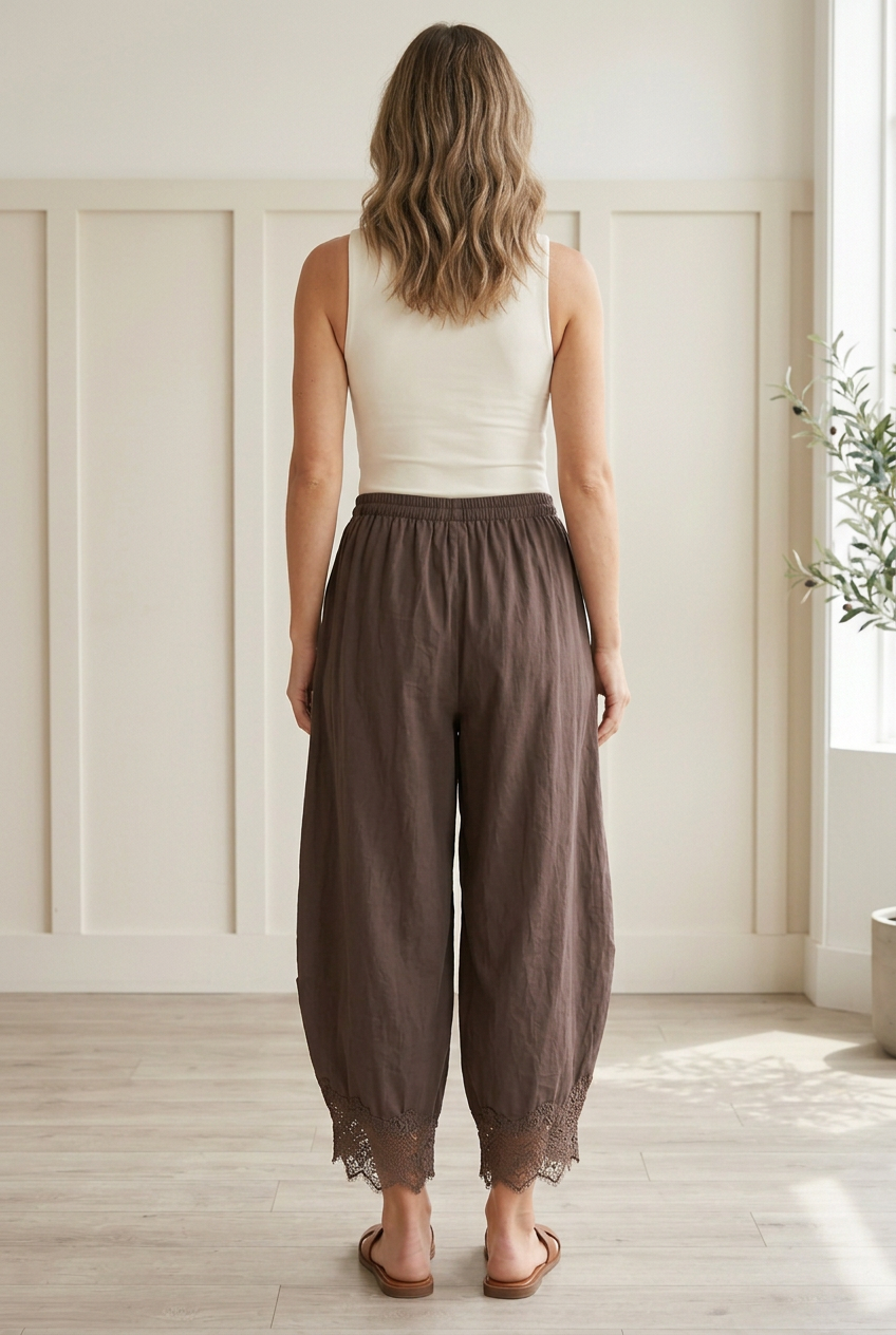 Rear view of brown lace trim barrel pants