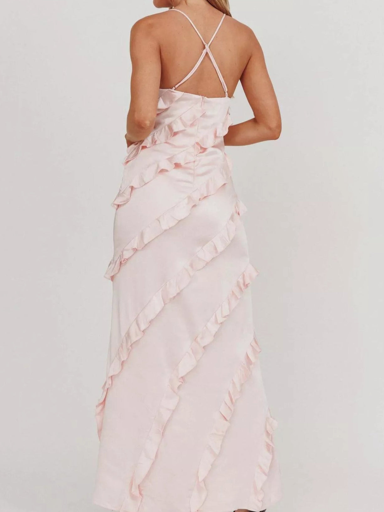 Lightweight ruffled spaghetti strap maxi dress with sleek fit and breezy movement, perfect for day or evening wear