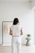 White cropped knit sweater with American flag print and short sleeves