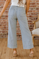 Women’s wide leg jeans with blue stripe pattern and cuffed hem detail