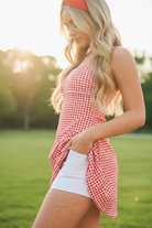 Red gingham skort dress with double layer design and breathable active fabric