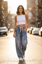 Relaxed fit denim cargo jeans with drawstring waist and tapered leg